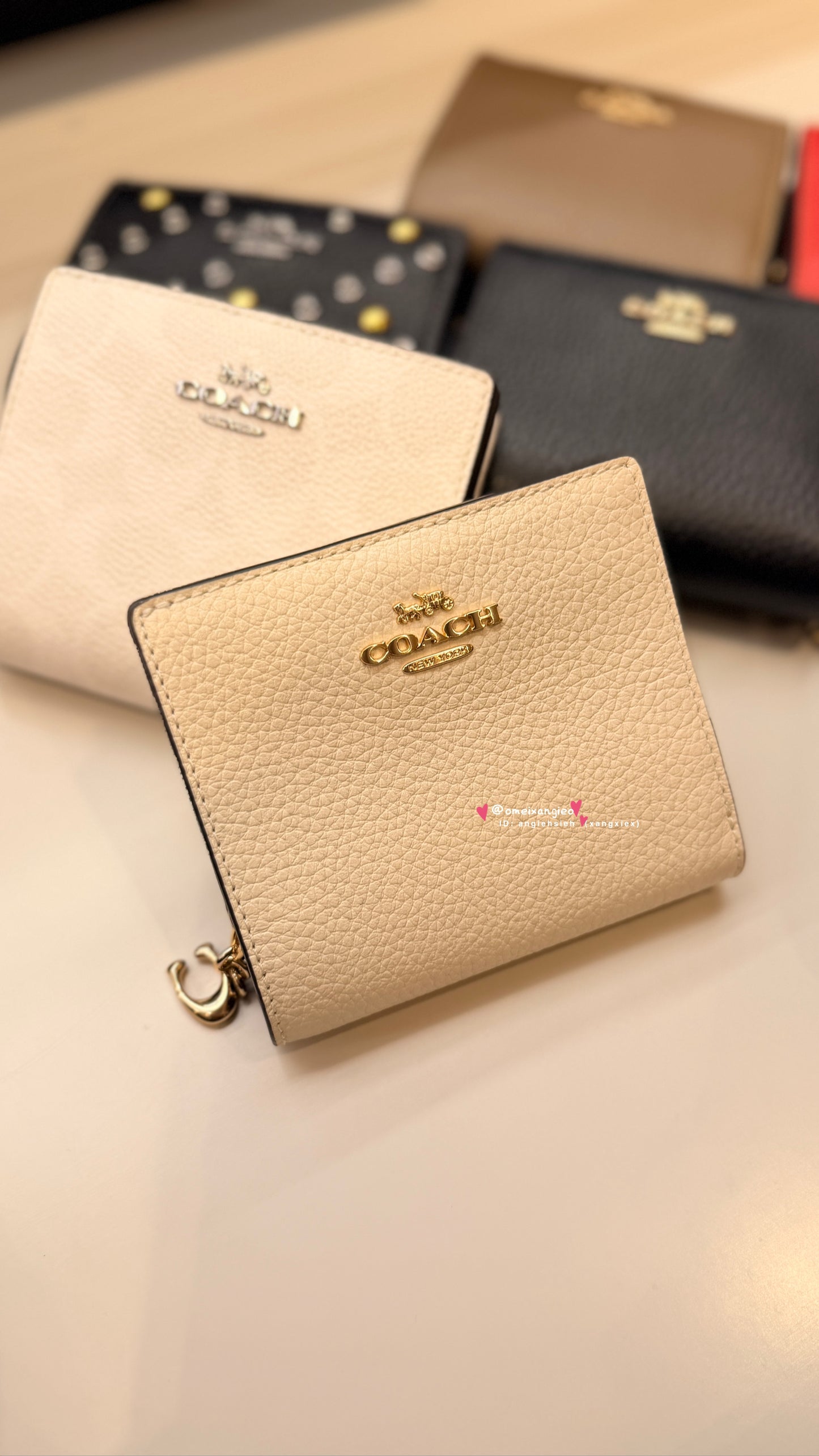 Coach 經典款小短夾