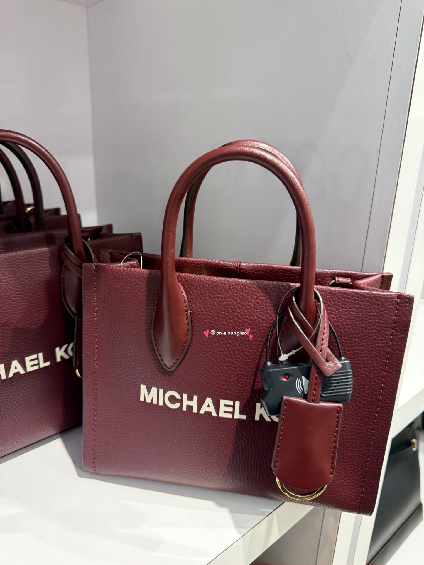 Michael Kors Q毛肩帶紙袋包