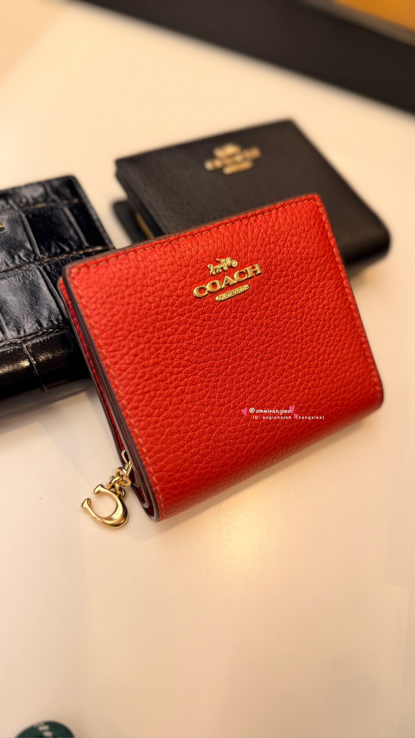 Coach 經典款小短夾