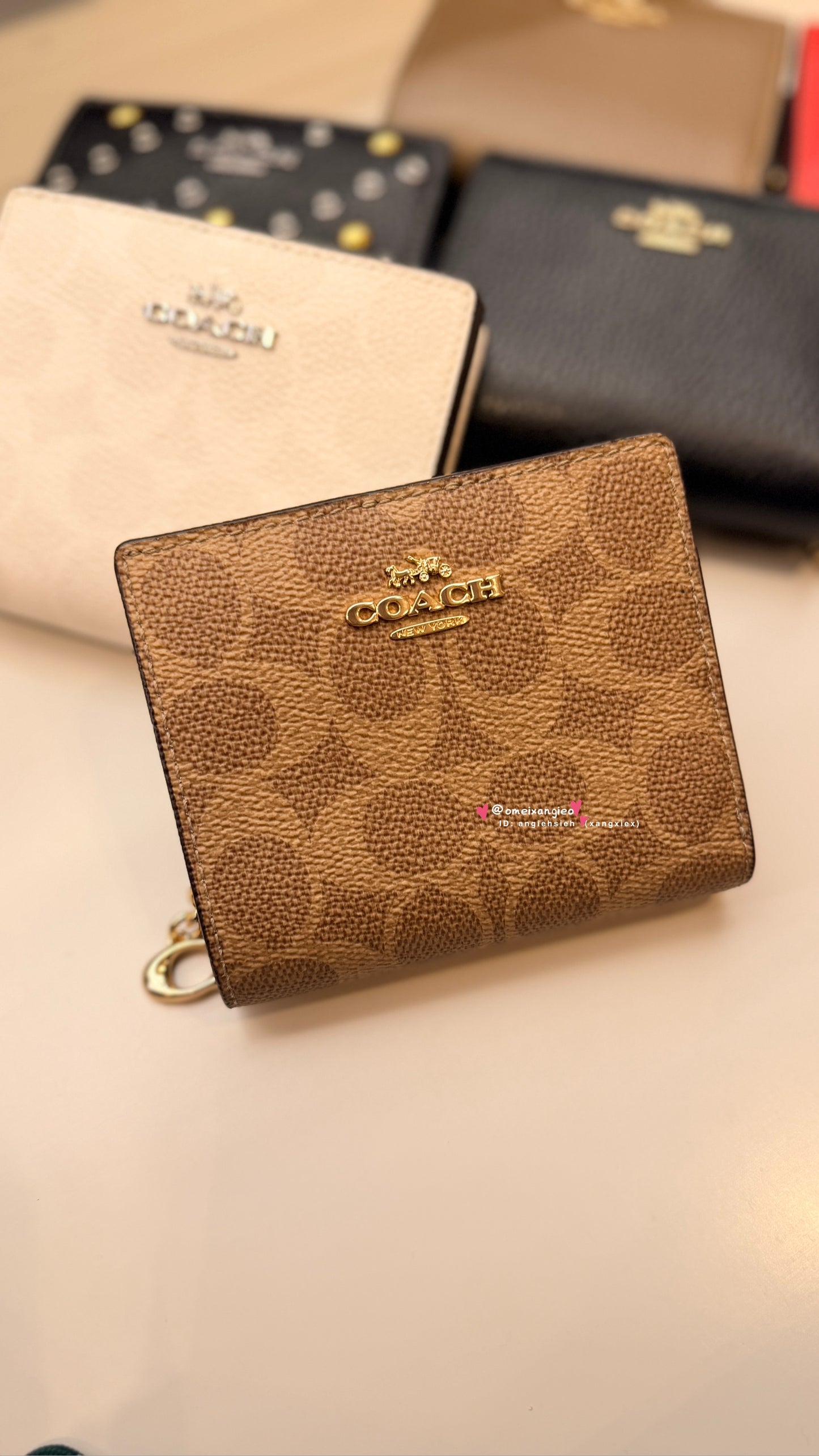 Coach 經典款小短夾